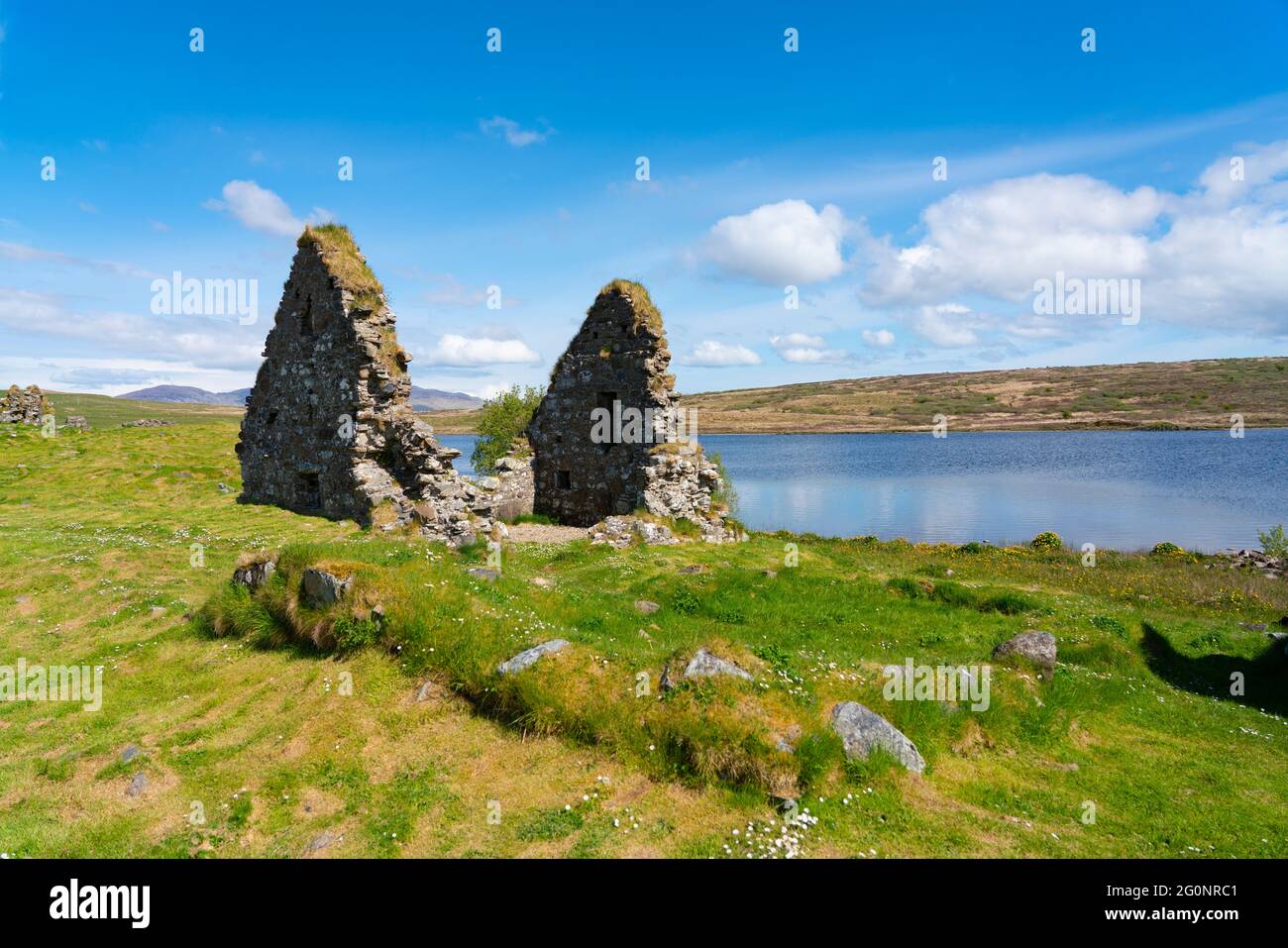 View of Finlaggan historical monument site on Eilean Mòr on Loch Finlaggan, Islay, Inner Hebrides, Scotland, UK Stock Photo