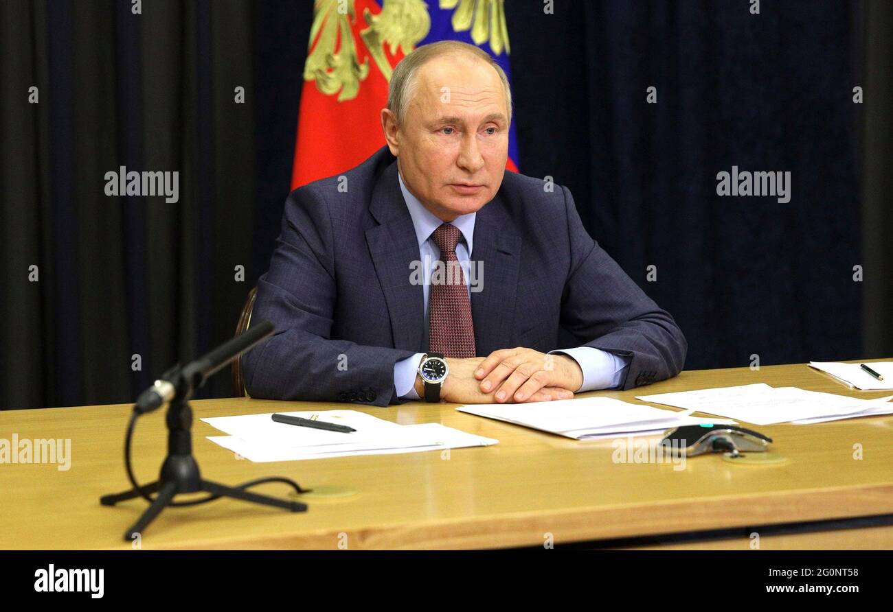 Russian President Vladimir Putin hosts a video conference meeting with Russian Federation Government leaders from the official Bocharov Ruchei residence at Cape Idokopas June 2, 2021 in Sochi, Russia. Stock Photo