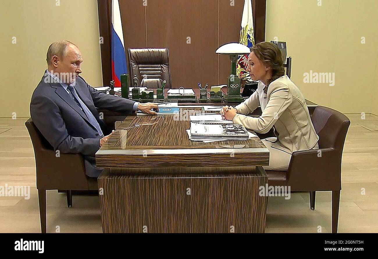 Russian President Vladimir Putin holds a face-to-face meeting with Anna Kuznetsova, Presidential Commissioner for Children's Rights, at the official Bocharov Ruchei residence May 31, 2021 in Sochi, Russia. Stock Photo