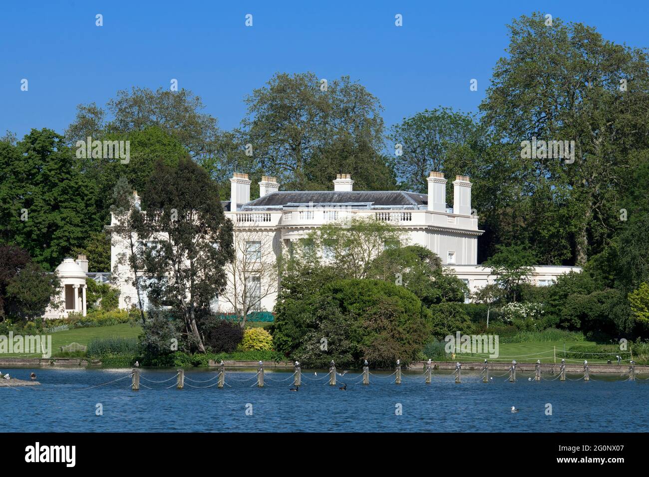 The Holme a grand mansion on edge boating lake Regents Park London Stock Photo