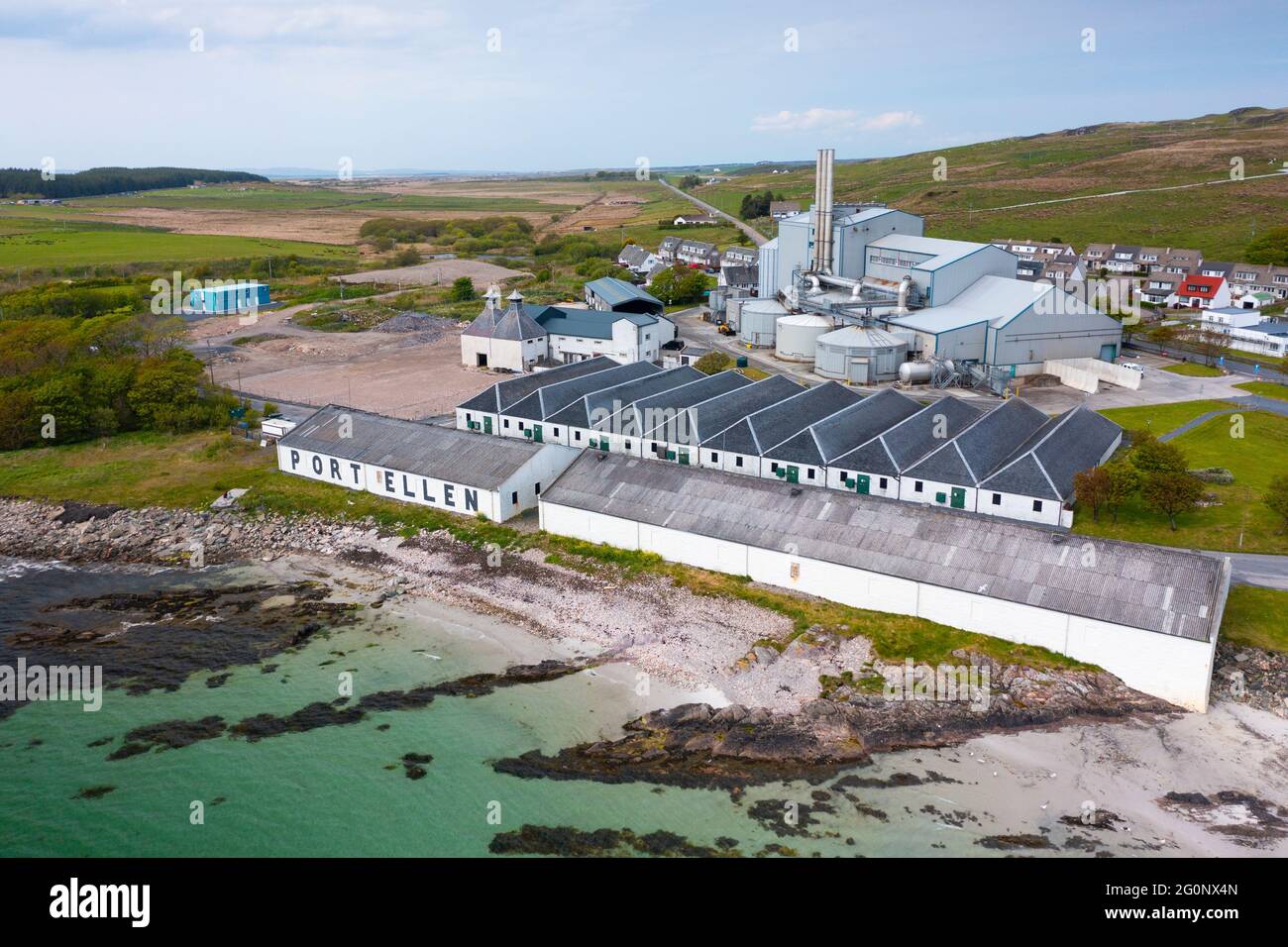 Aerial view from drone of old Port Ellen distillery and Diageo maltings in Port Ellen on Islay , Inner Hebrides , Scotland, UK Stock Photo