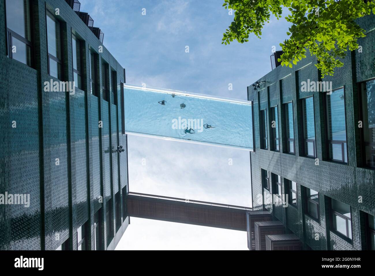 Swimmers use Sky Pool first floating Swimming Pool, London, United Kingdom. 02 June 2021 Stock