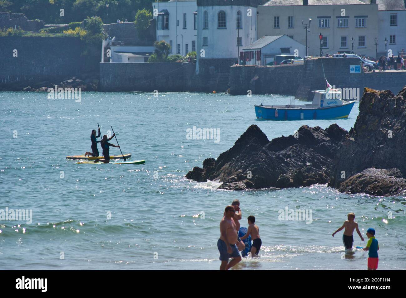 Paddle boarding lesson in Tenby,Wales,UK Stock Photo - Alamy