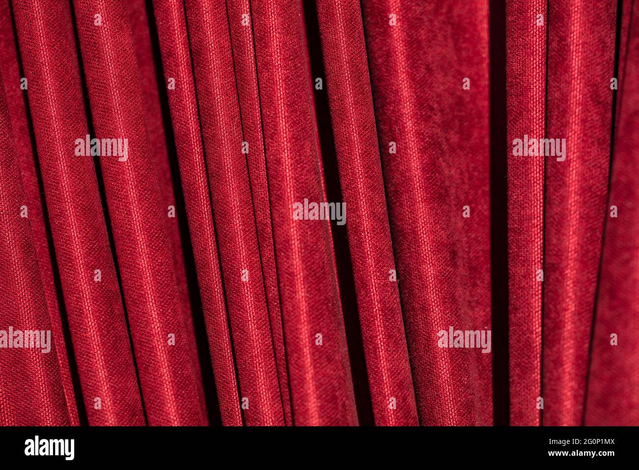 Red curtain in theatre. Textured background Stock Photo