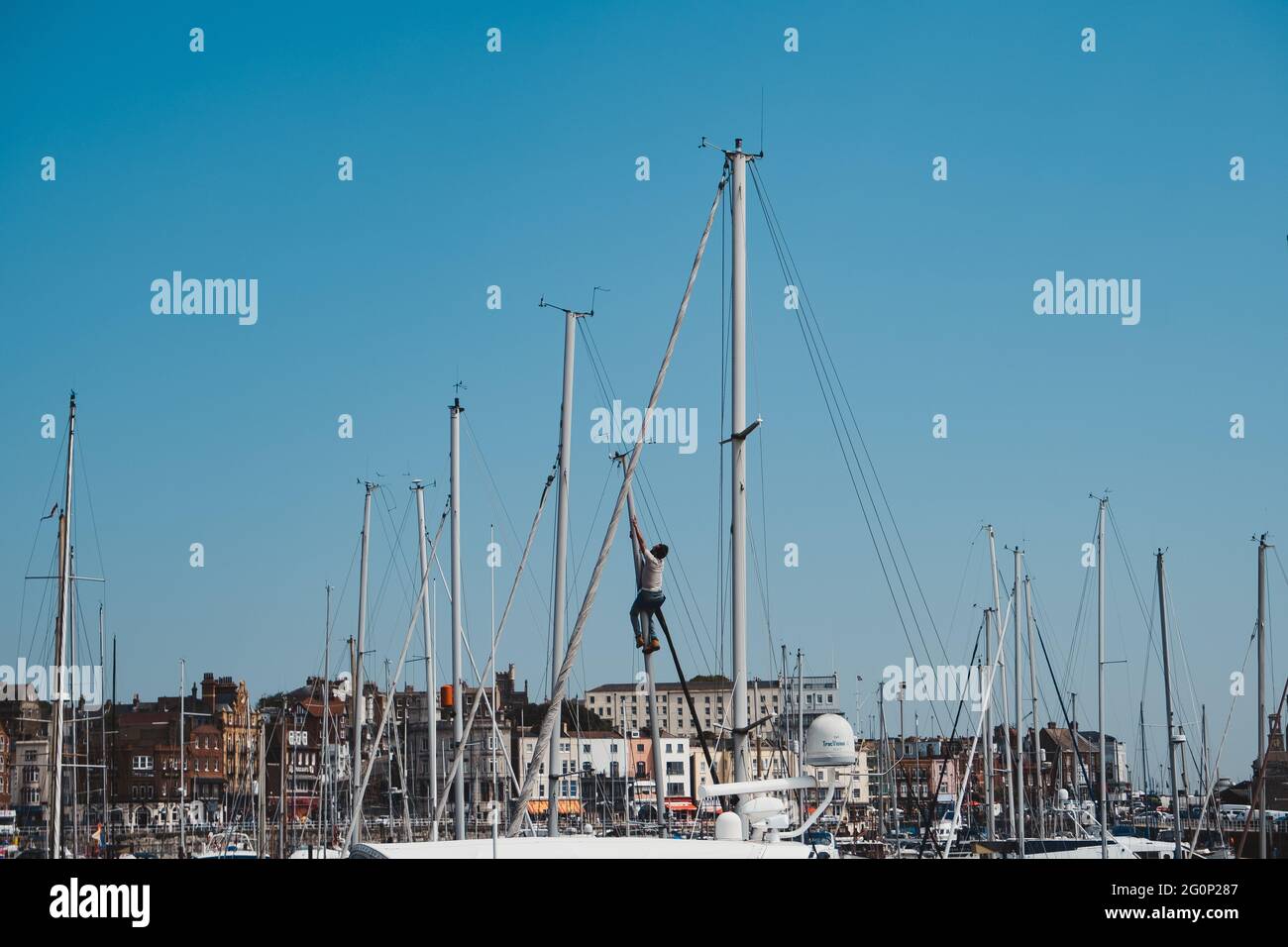 Ramsgate, Kent | UK - 2021.05.29: Male working up the mast of a sailing ...