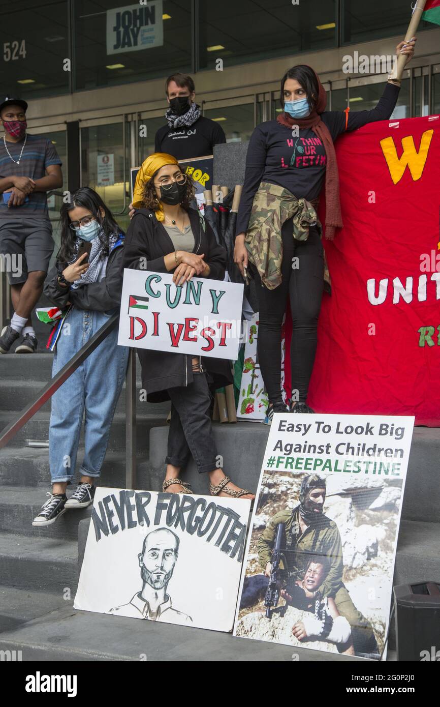 CUNY students and others demonstrate at John Jay College for CUNY to divest and cut all ties with Israel who is devestating the Palestinian people in Gaza and elsewhere in Israel. Stock Photo