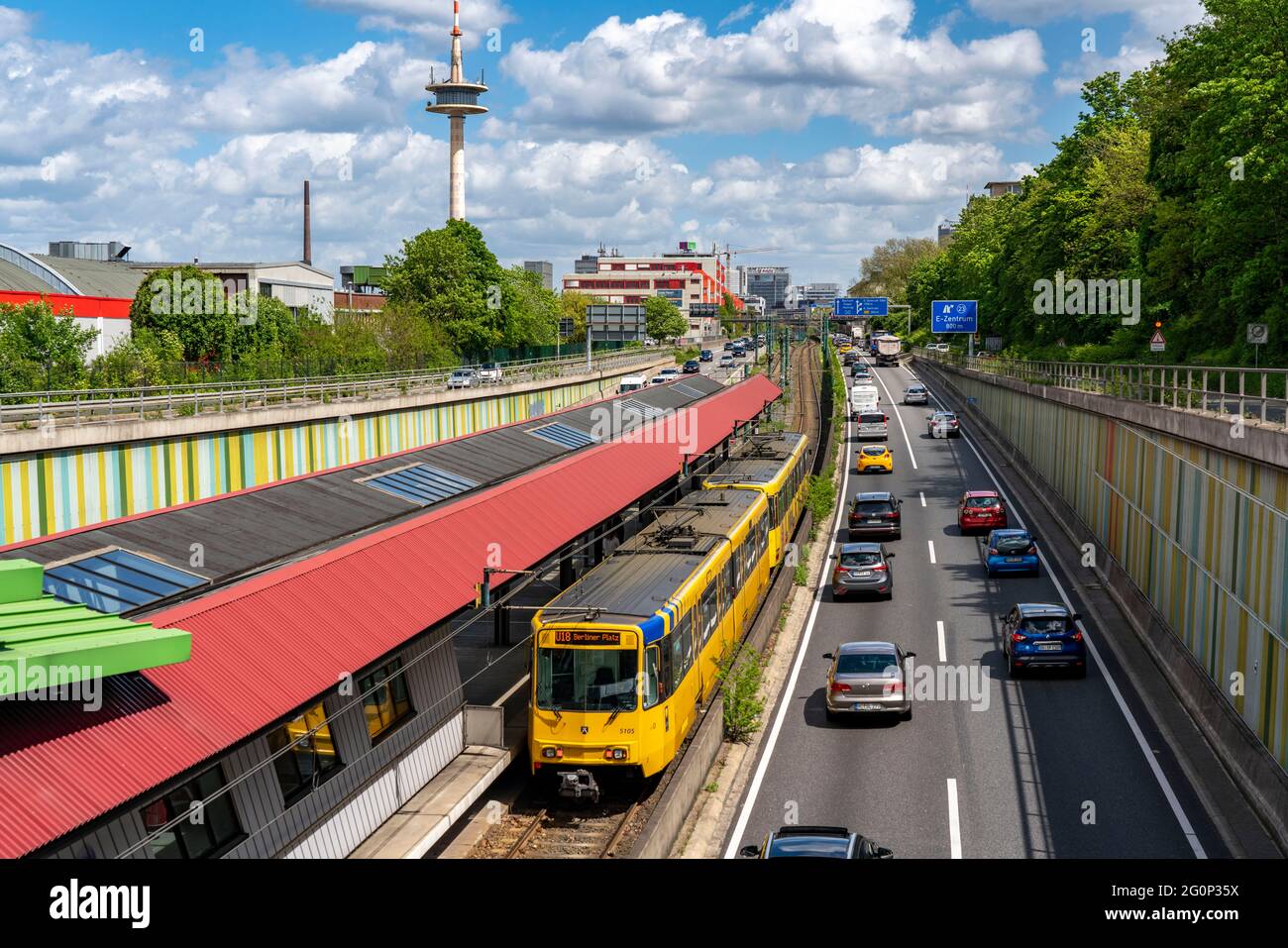 A40 motorway, Ruhrschnellweg, in the through-route in Essen, noise barrier, tram, Ruhrbahn underground railway, Hobeisenbrücke stop, NRW, Germany Stock Photo