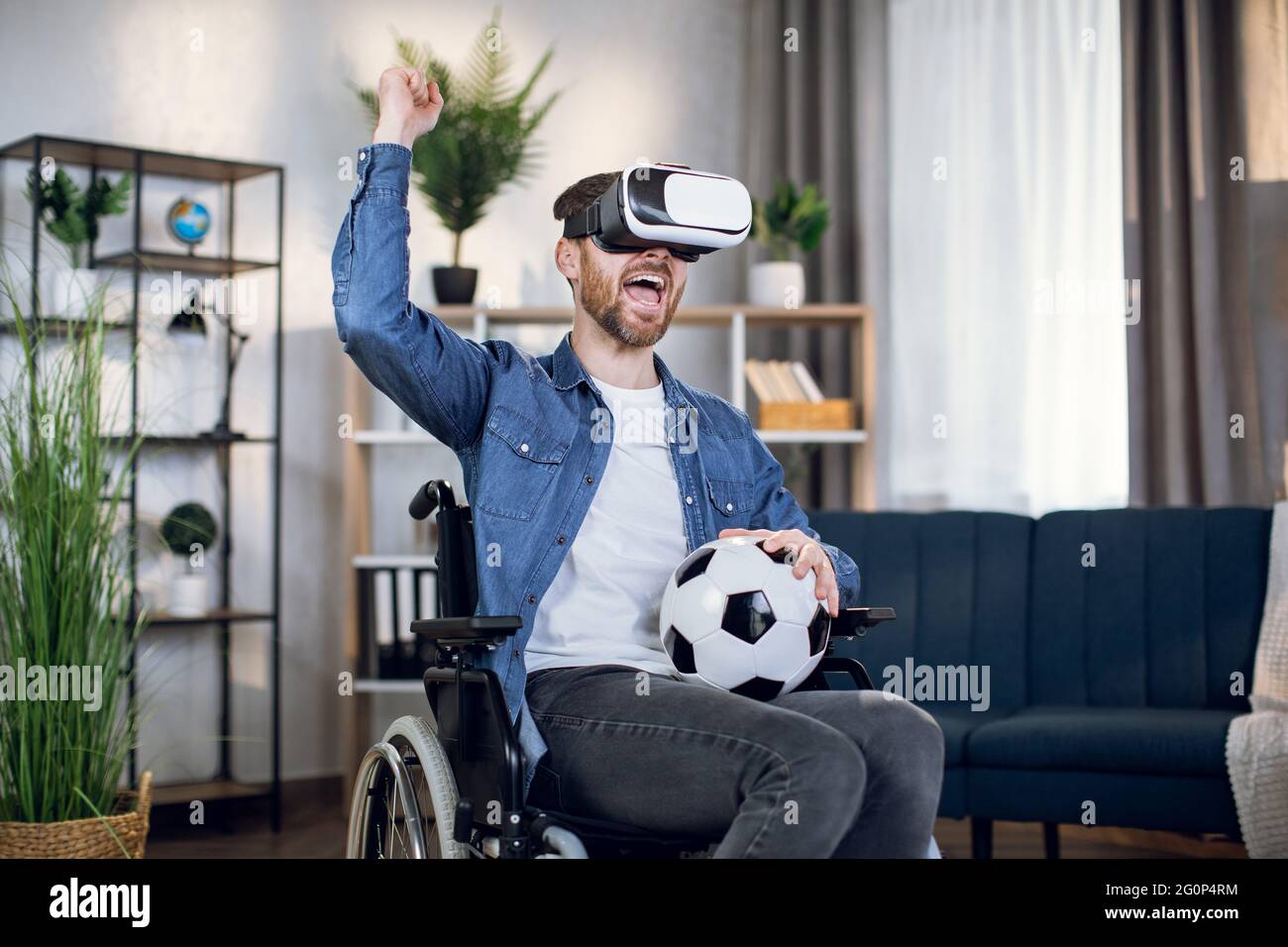 Playing football wearing glasses hires stock photography and images Alamy