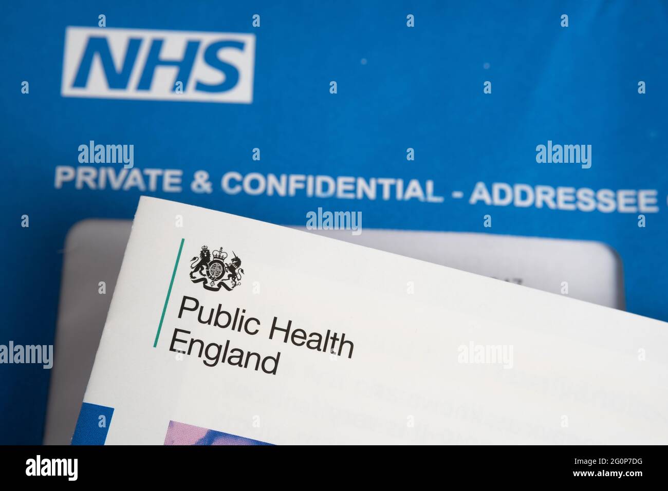 Public Health England logo seen on COVID vaccination brochure. Stafford ...