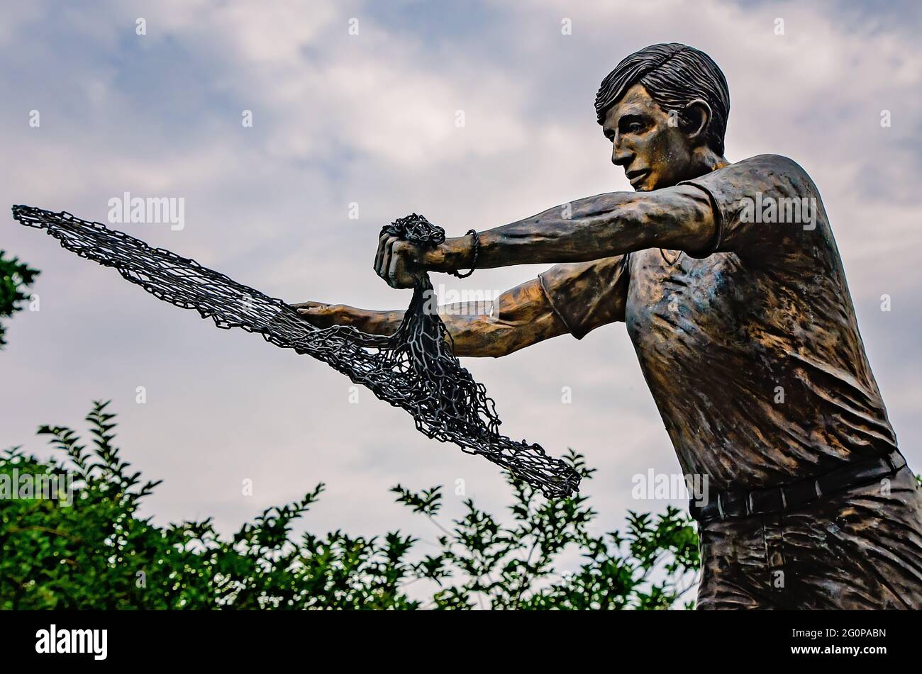 Fisherman with net statue hires stock photography and images Alamy