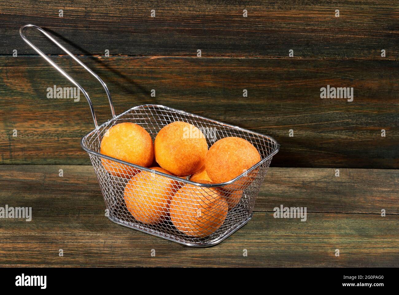 Traditional Colombian buñuelos (Deep Fried Cheese Bread) Text space Stock Photo