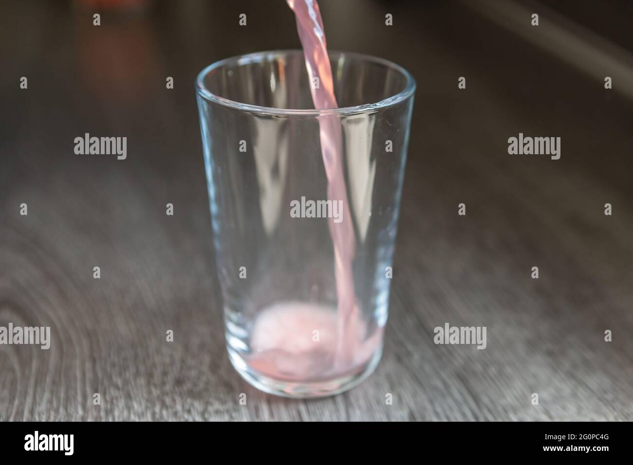 Pouring a drink Stock Photo