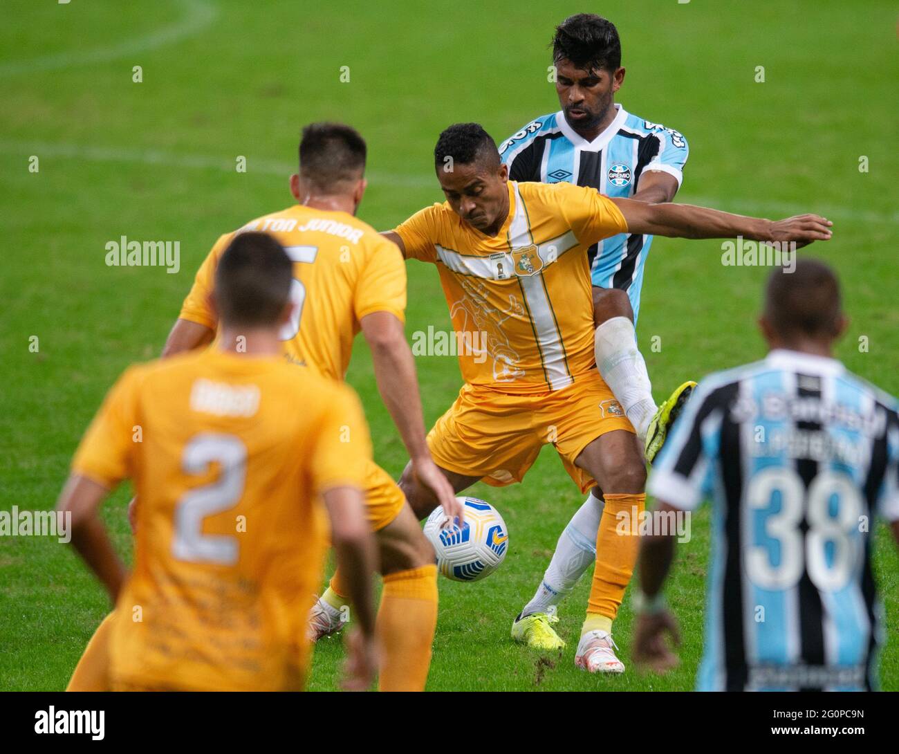 2nd June 2021; Arena do Gremio, Porto Alegre, Brazil; Copa Do Brazil, Gremio versus Brasiliense; Thiago Santos of Gremio holds off Jorge Henrique of Brasiliense Stock Photo