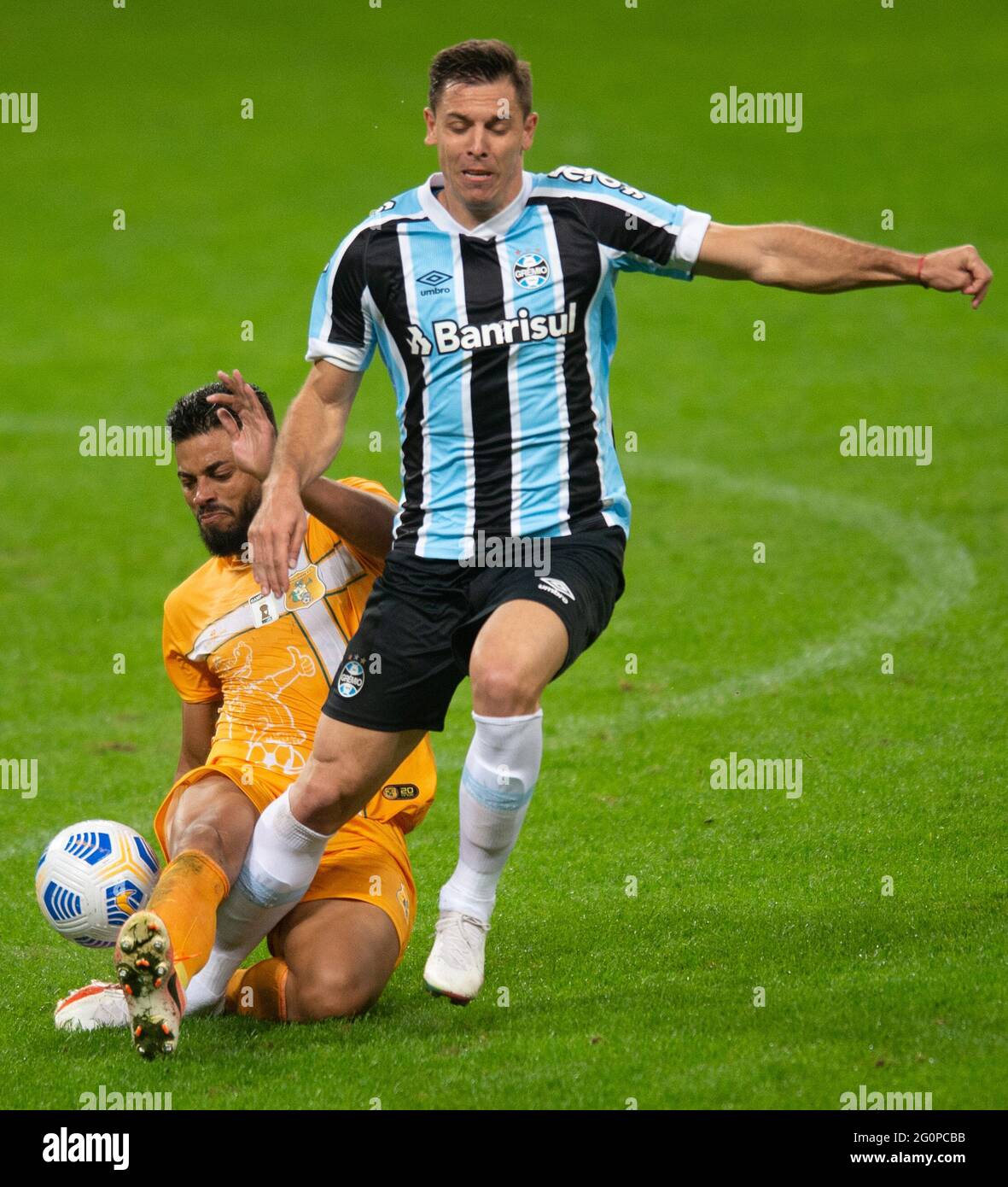 2nd June 2021; Arena do Gremio, Porto Alegre, Brazil; Copa Do Brazil, Gremio versus Brasiliense; Diego Chur&#xed;n of Gremio is tackled from behind by Gustavo Henrique of Brasiliense Stock Photo