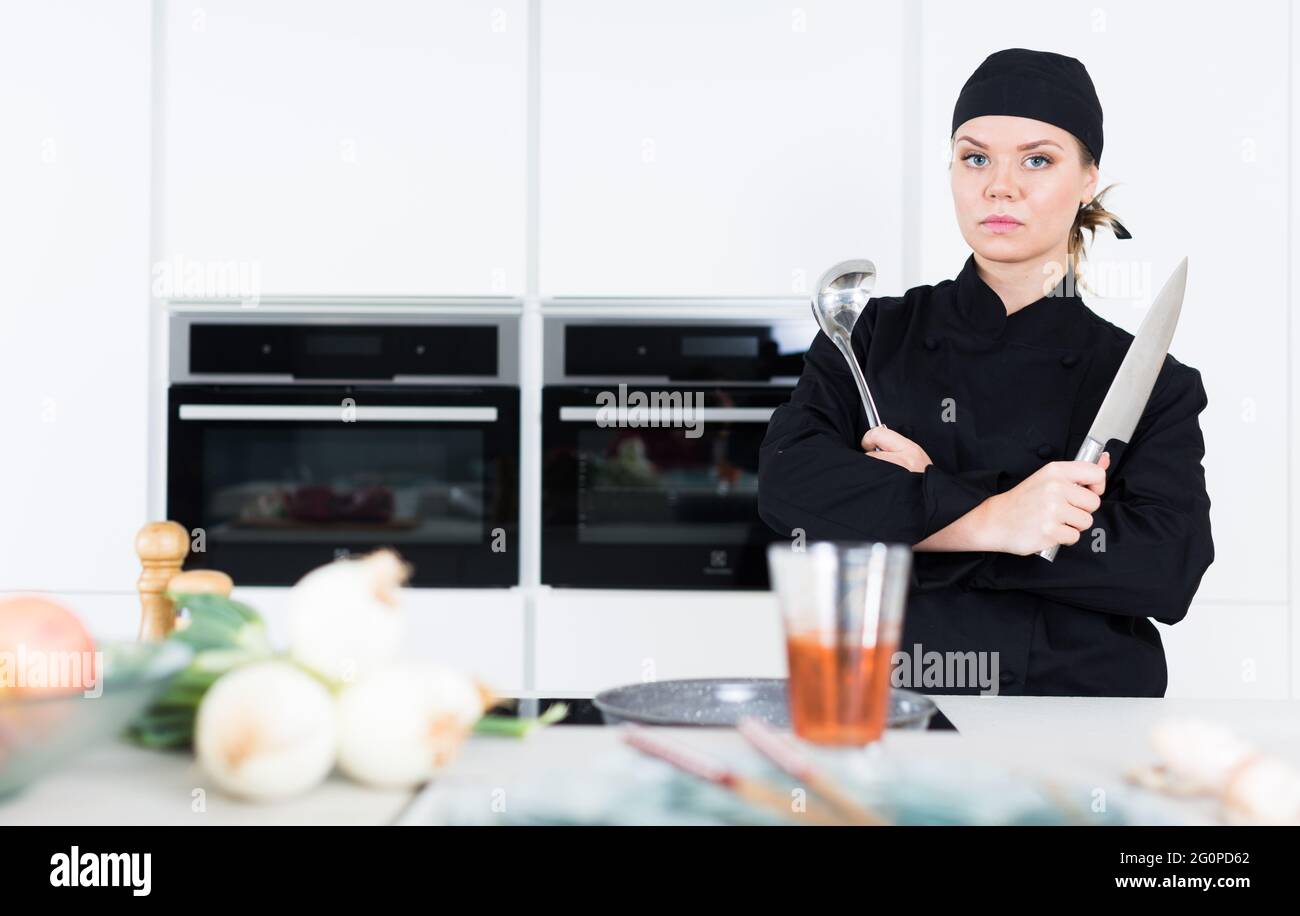 Young woman posing knife hi-res stock photography and images - Alamy