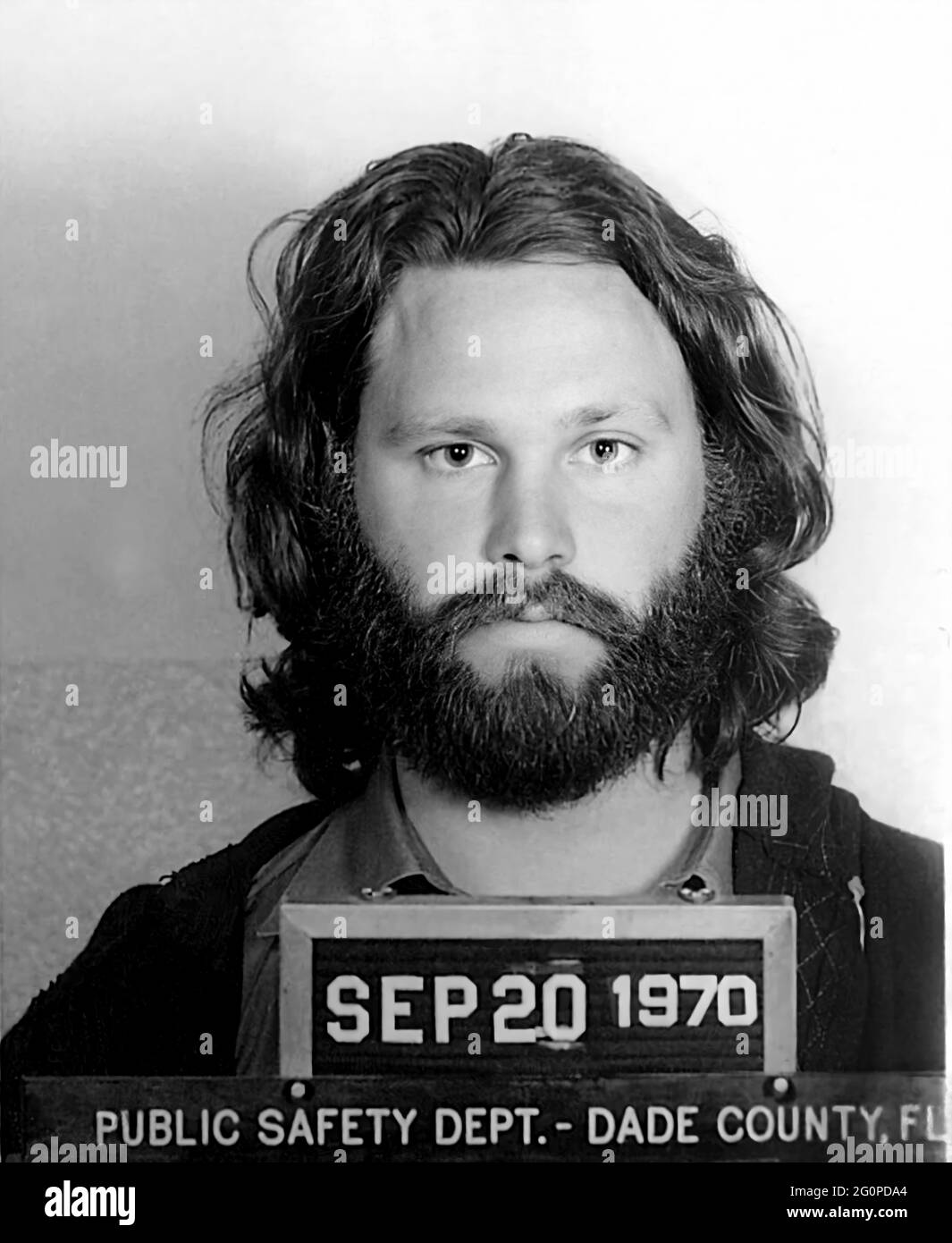 1970, 20 september, Dade County , FLORIDA , USA : The celebrated Rockstar singer and composer JIM MORRISON ( 1943 - 1971 ) of THE DOORS ( founded in 1965 ) when was arrested by Police Department in the official mug-shot . Jim had been charged  on misdemeanor indecent exposure and profanity charges . The singer was busted after he exposed himself during a March 1969 concert in Miami . Unknown photographer , Dade County's Public Safety Department . - HISTORY - FOTO STORICHE  - MUSIC - MUSICA - cantante - COMPOSITORE - ROCK STAR - ARRESTO - Arrestation - ARRESTATO DALLA POLIZIA - FOTO SEGNALETICA Stock Photo