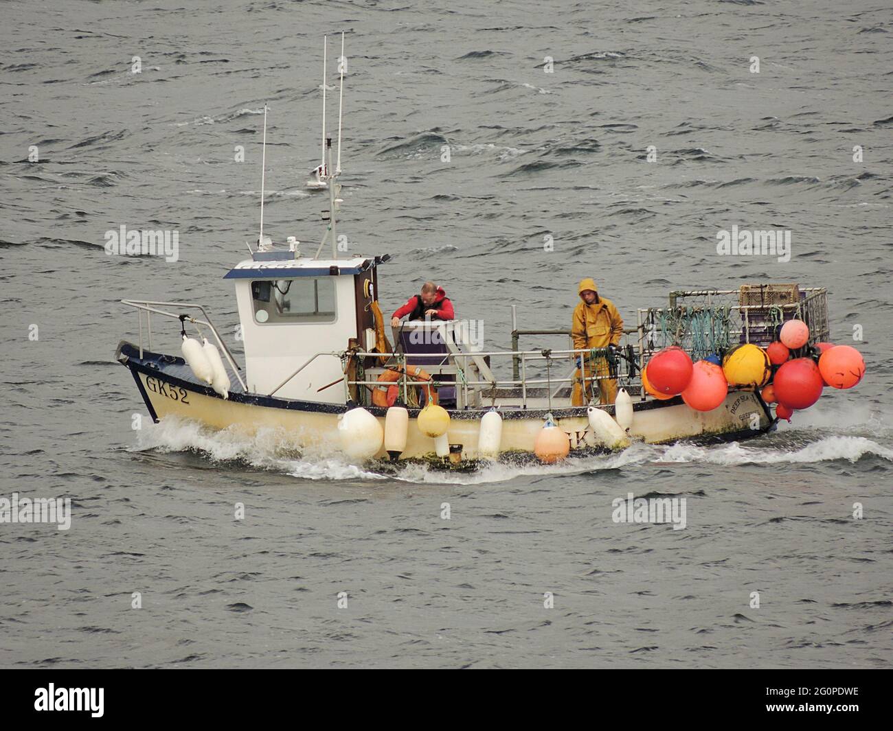 Deep Sea One (GK52), a Greenock-registered fishing boat, working the waters of the Firth of Clyde just off Gourock in Inverclyde. Stock Photo