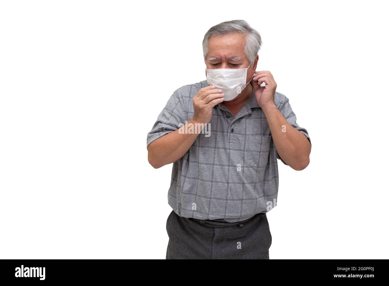 Asian senior man wearing a protective face mask for plague coronavirus or covid-19 infectious disease. Facial hygienic mask for safety outdoor environ Stock Photo