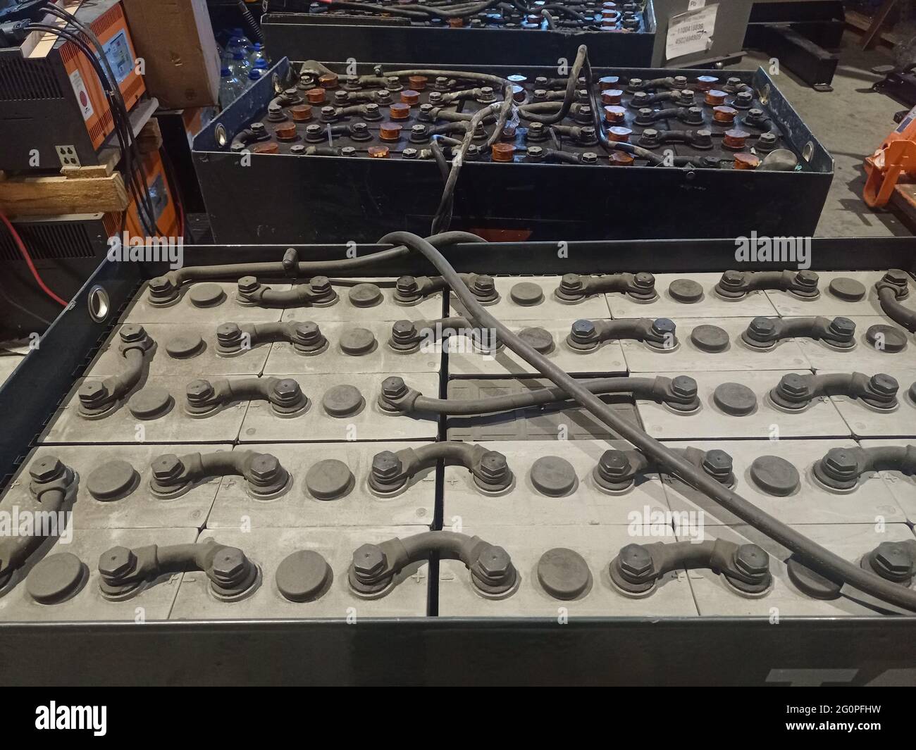 Industrial battery charging process. Electric forklift battery on