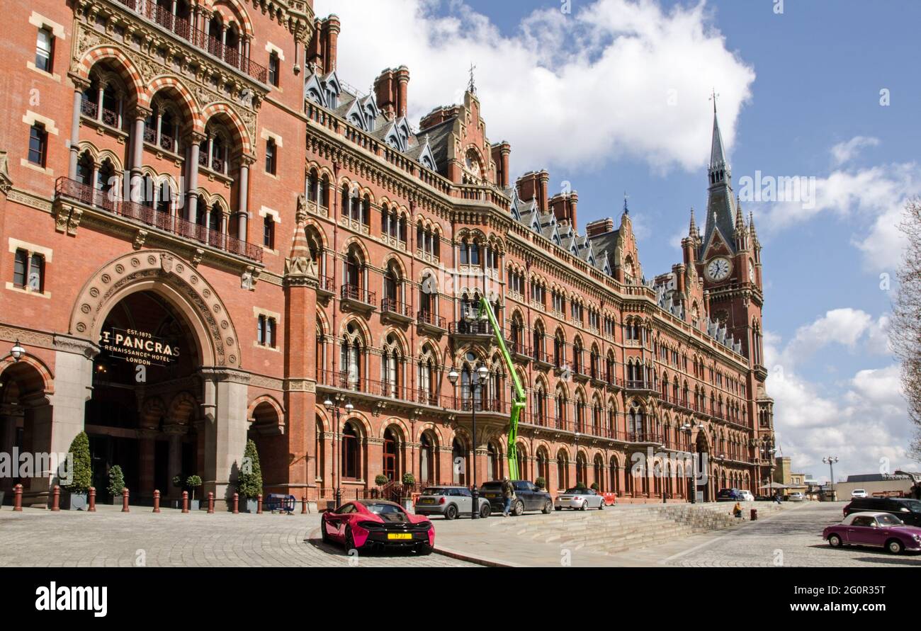 London, UK - April 16, 2021:  View of the historic Victorian Gothic facade of the hotel and railway station of St Pancras.  Eurostar trains to France, Stock Photo