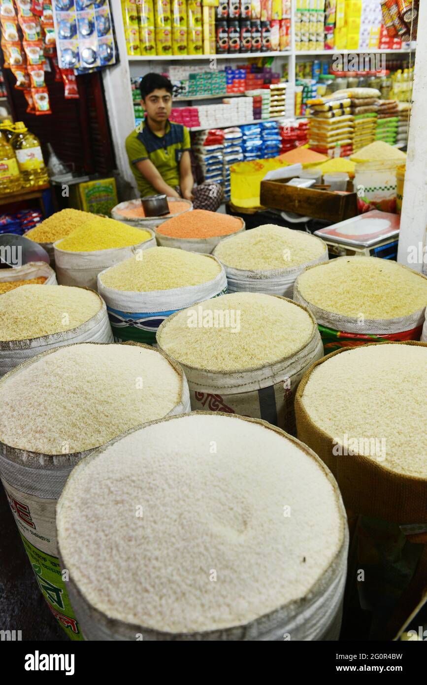 A rice and pulses vendor at the Karwan Bazar market in Dhaka