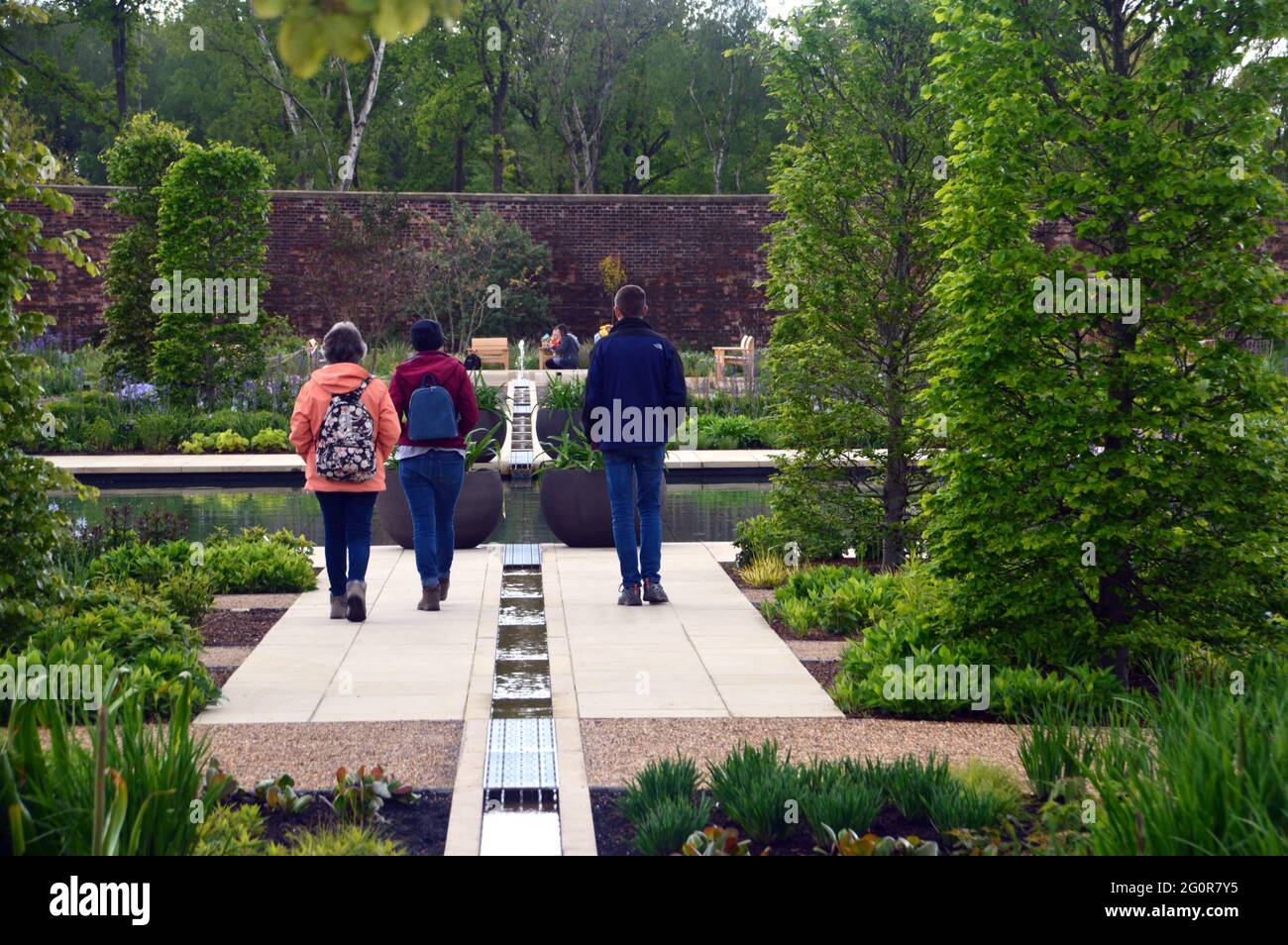 People Walking by the Pond and Water Features in the Victorian Weston