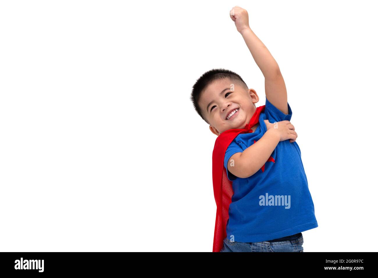 Asian boy with funny little power of hero isolated on white background, Superhero concept Stock Photo