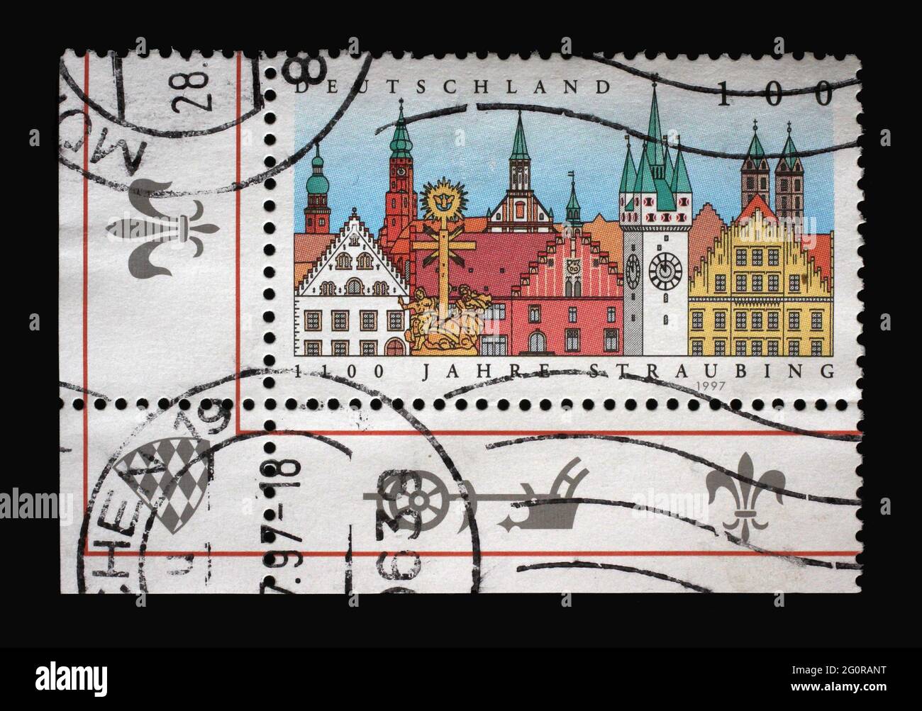 A stamp printed in Germany shows Straubing Cityscape, 1,100th anniversary of Straubing, a city in Lower Bavaria, southern Germany, circa 1997 Stock Photo