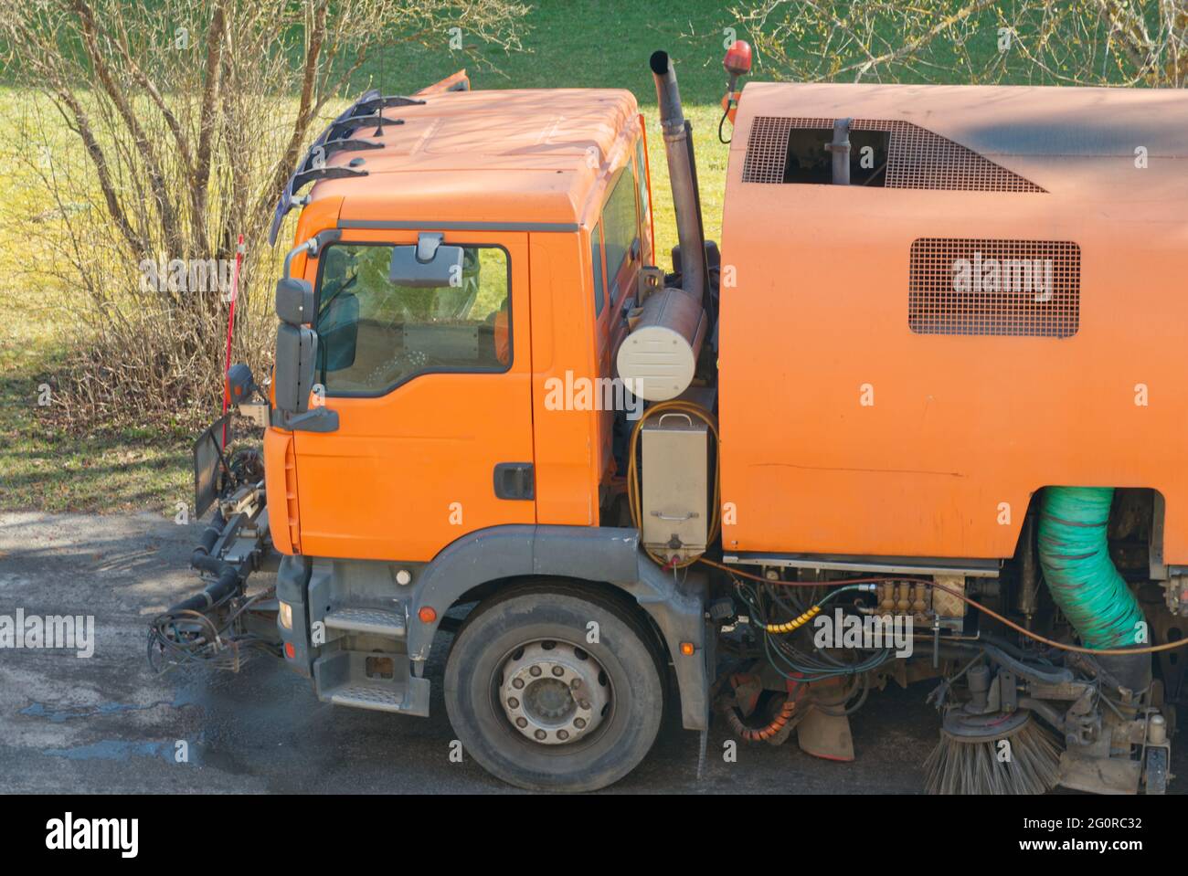 Cleaning machine cleans the street with shears Stock Photo Alamy