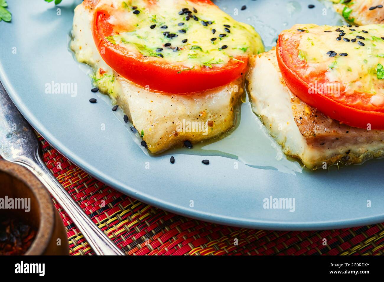 Pangasius fish fillet with vegetables on plate.Healthy dinner. Stock Photo