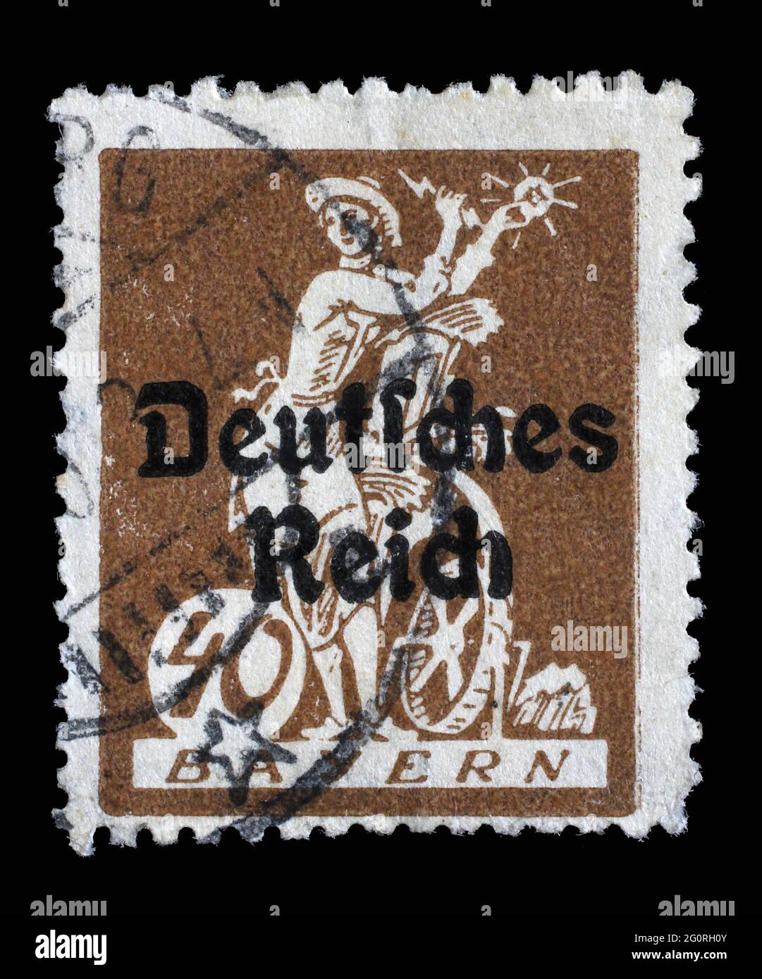 Stamp printed in printed in Bavaria with a 'Deutsches Reich' overprint shows an allegory of electricity, harnessing light to a water wheel, circa 1920 Stock Photo