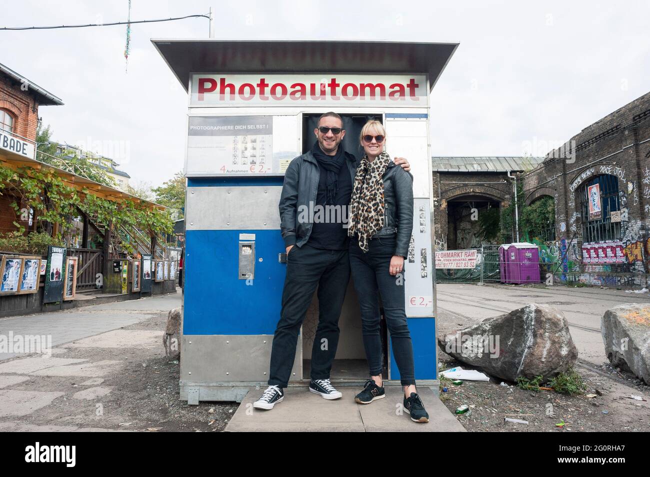 Standing outside the photo booths / kiosks in the city of Berlin Stock Photo