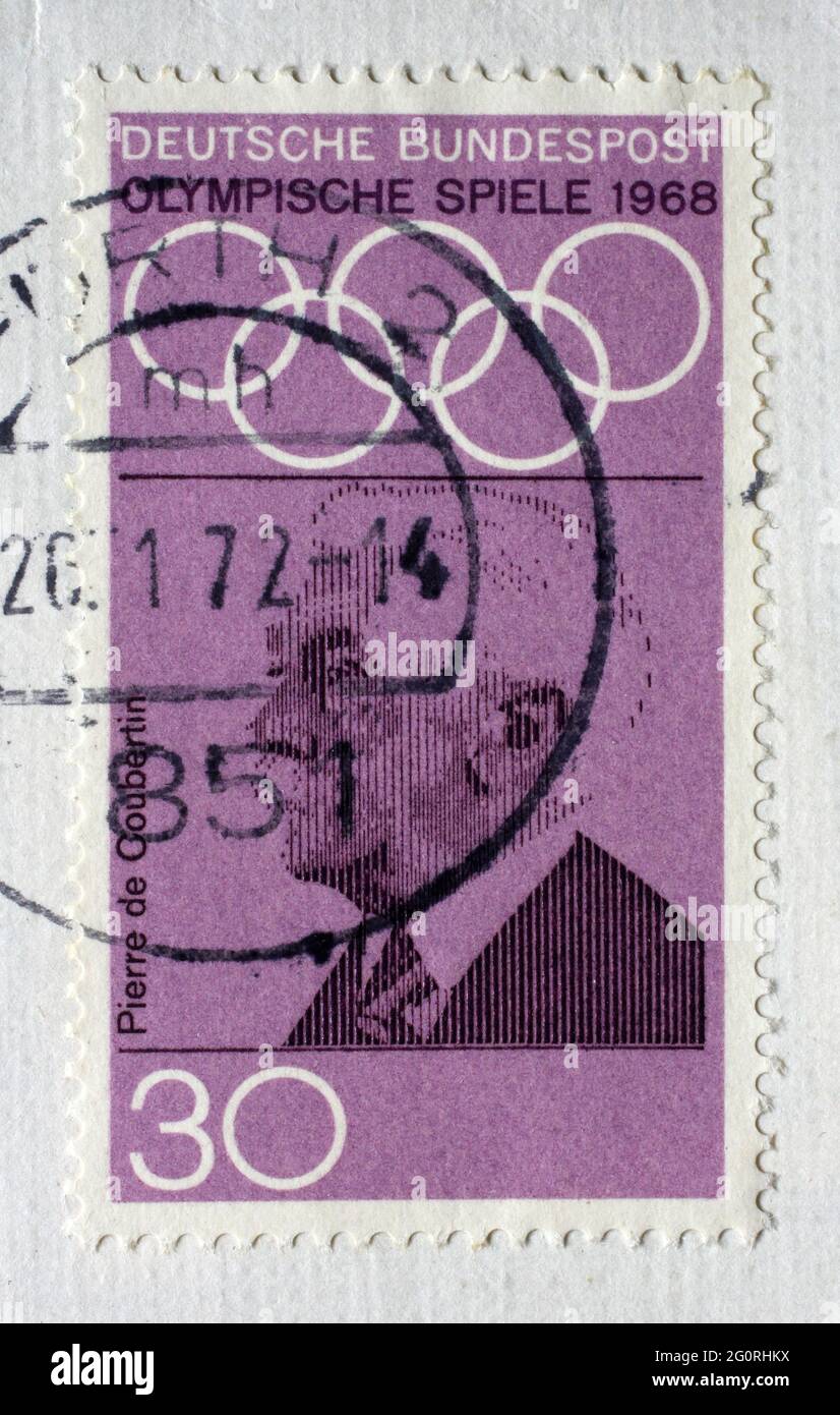 Stamp printed in Germany showing portrait of Pierre de Coubertin, 1968 Summer Olympics, the Games of the XIX Olympiad, Mexico City, circa 1968 Stock Photo