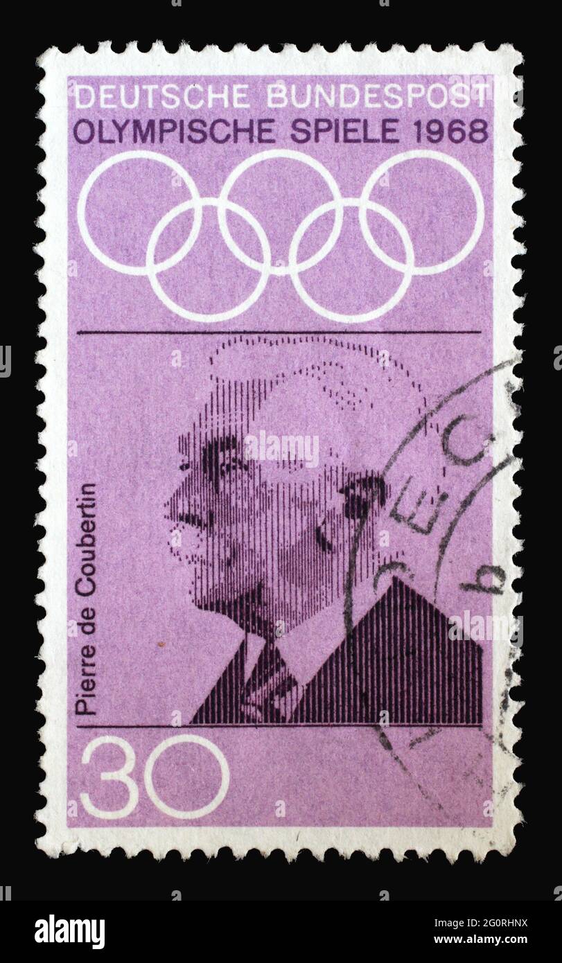 Stamp printed in Germany showing portrait of Pierre de Coubertin, 1968 Summer Olympics, the Games of the XIX Olympiad, Mexico City, circa 1968 Stock Photo