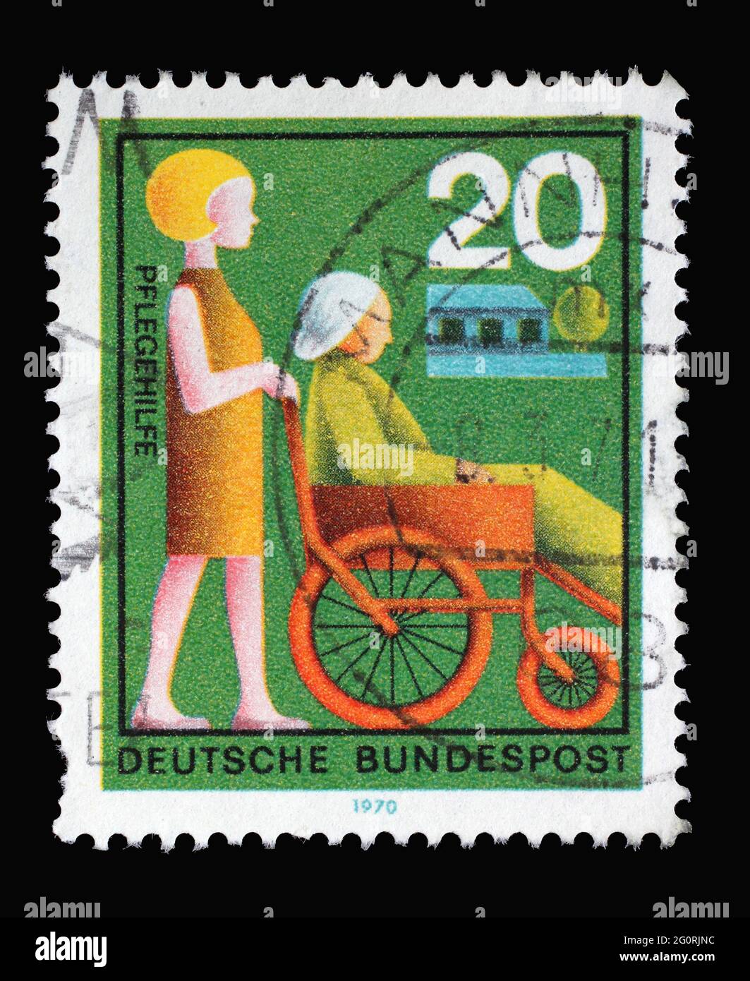 Stamp printed in Germany showing a helper pushes a wheelchair, Volunteer Nursing Aid, circa 1970 Stock Photo