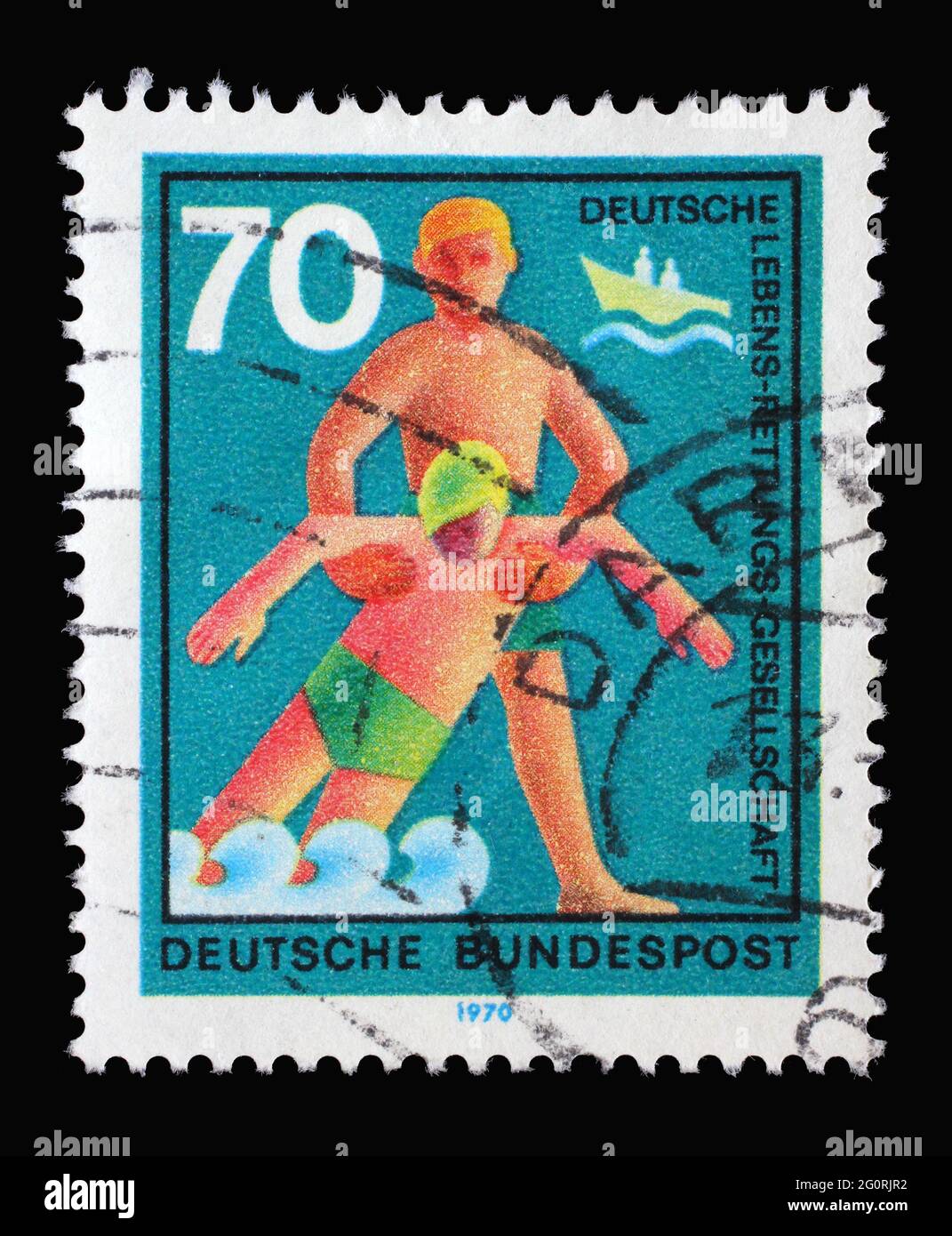 Stamp printed in Germany showing a rescuer pulls injuries out of the water, Voluntary help service lifesaving, circa 1970 Stock Photo