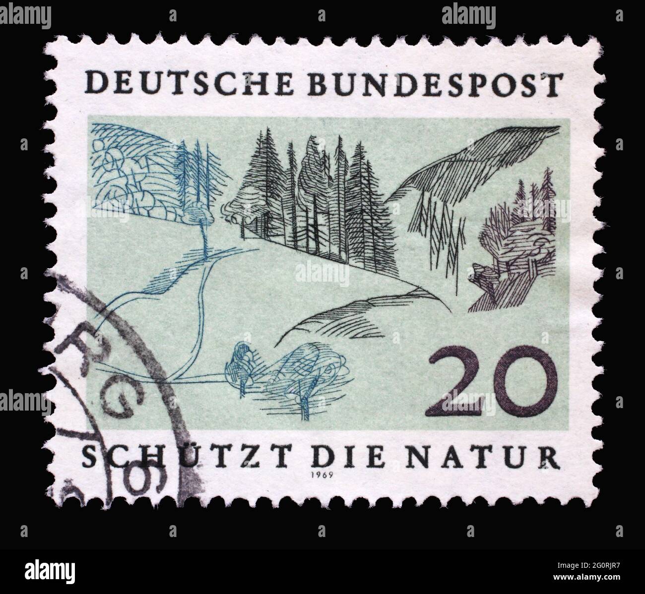 Stamp printed in Germany showing a landscape: low mountain range, European Nature Preservation Year, circa 1969 Stock Photo
