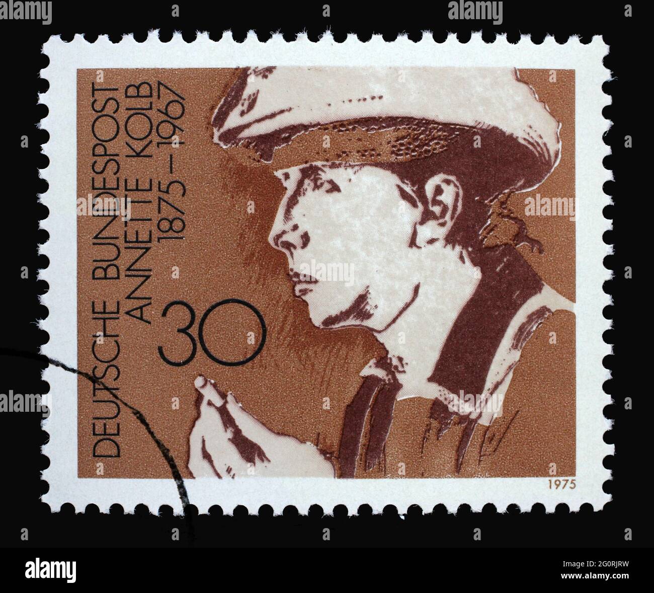 A stamp printed in Germany showing a portrait of the writer Annette Kolb, circa 1975 Stock Photo