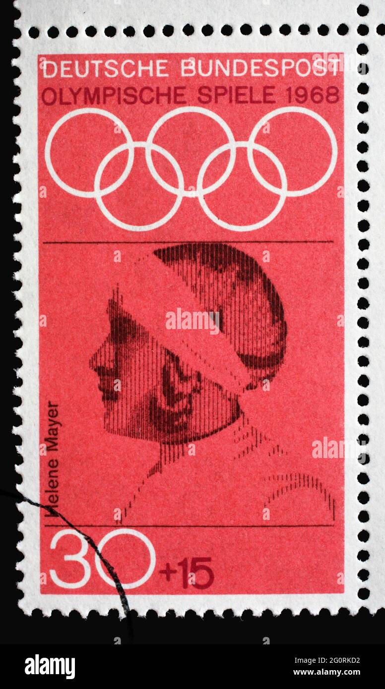 Stamp printed in Germany showing portrait of Helene Mayer, fencer, 1968 Summer Olympics, the Games of the XIX Olympiad, Mexico City, circa 1968 Stock Photo