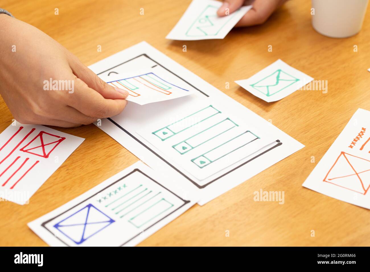 UX Graphic designer creative sketch and planning prototype wireframe for web mobile phone. Application development and user experience concept Stock Photo