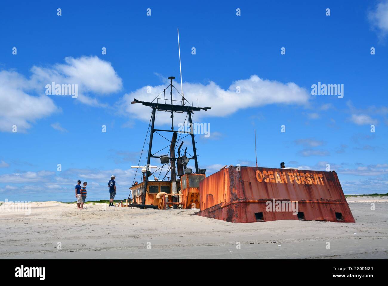 The fishing trawler Ocean Pursuit stranded on the beach at Oregon Inlet, Nags Head, NC March 1, 2020 and over a year later is sinking into the beach. Stock Photo