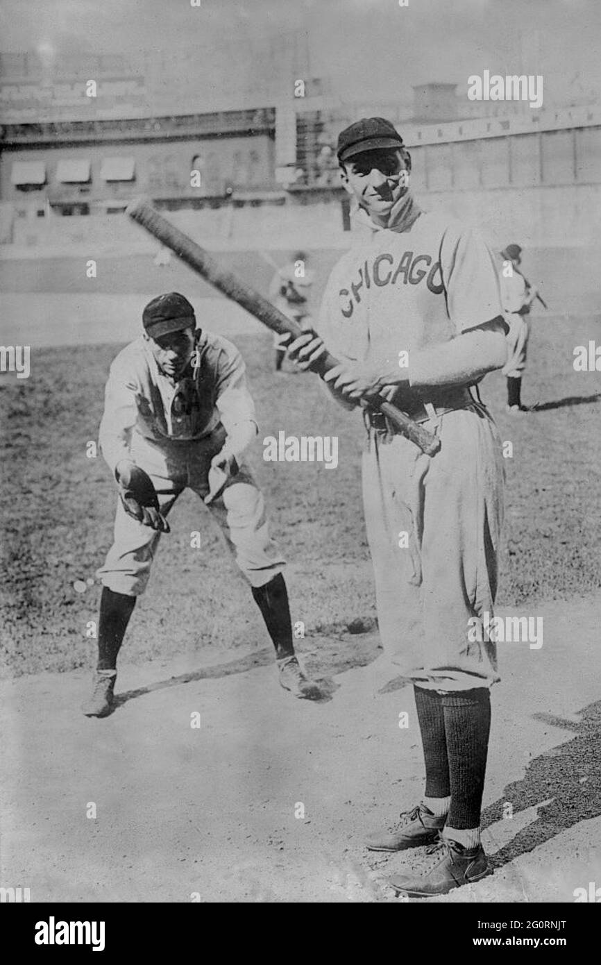 Arther Solly Hofman batting, and Jack Pfiester, a pitcher playing catcher, Chicago Cubs 1907. Stock Photo