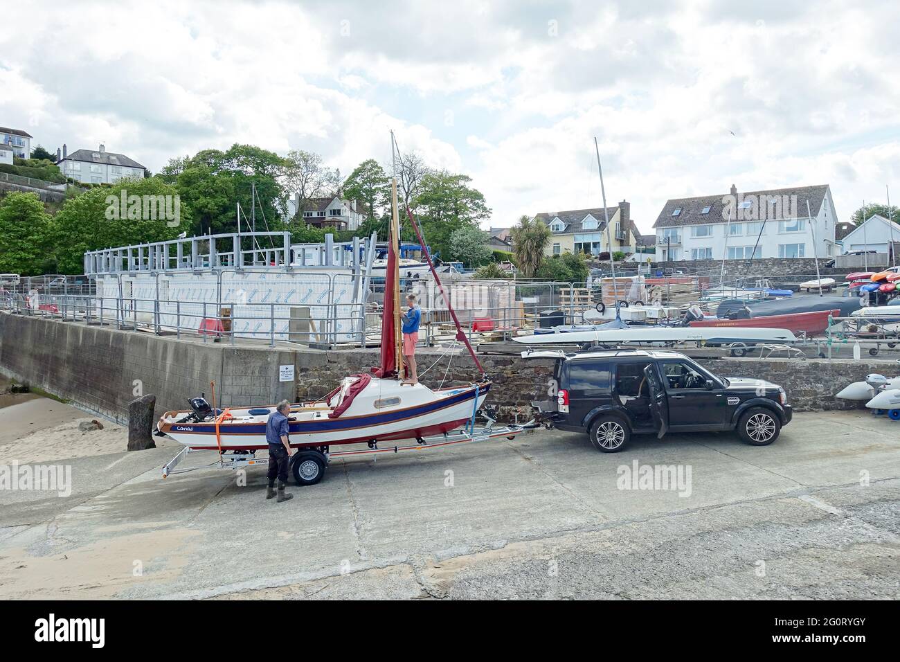 Boat launching, Saundersfoot Harbour, Pembrokeshire, Wales Stock Photo