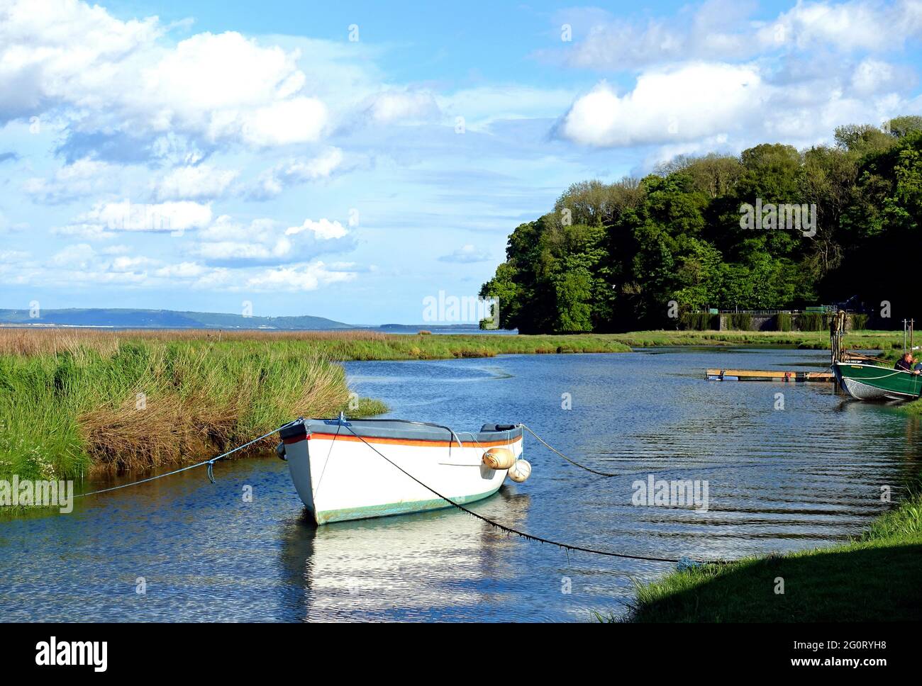 Boats moored in the River Coran, Laugharne, Carmarthenshire, Wales Stock Photo