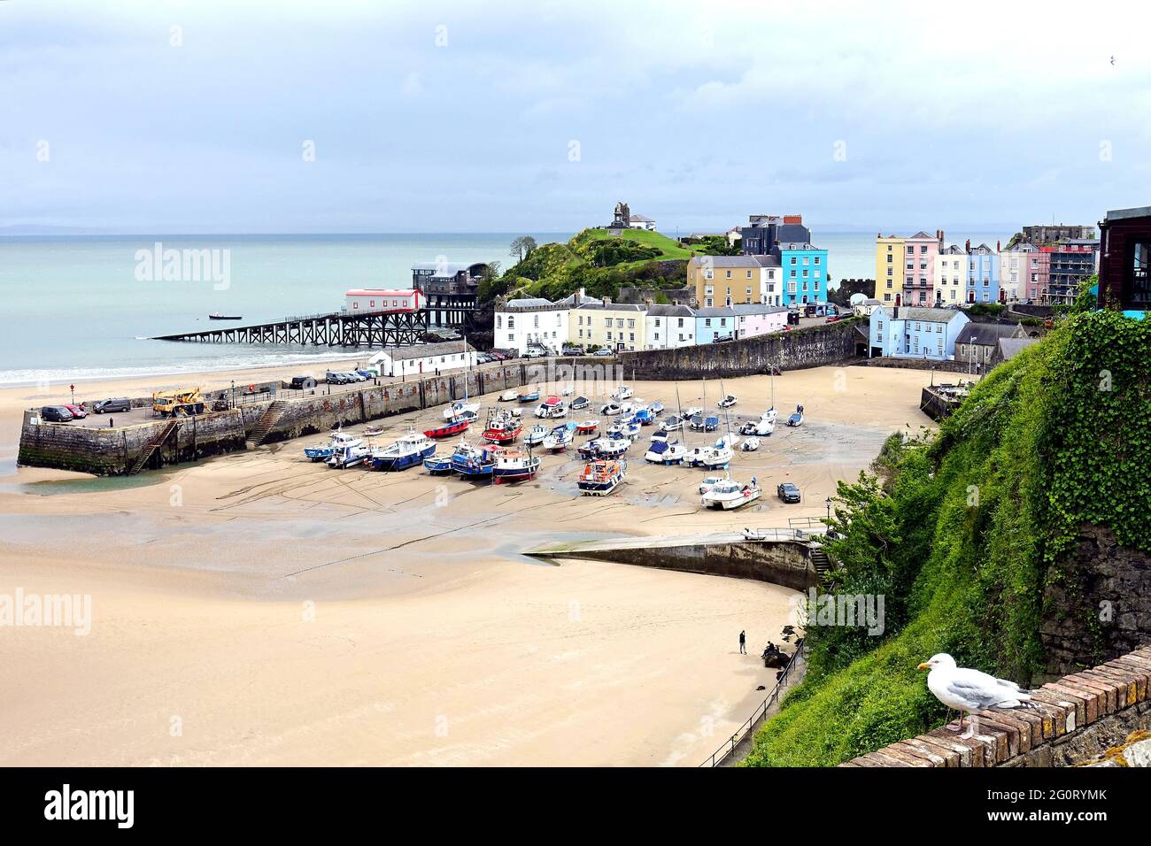 Low tide at Tenby Harbour, Pembrokeshire, Wales Stock Photo