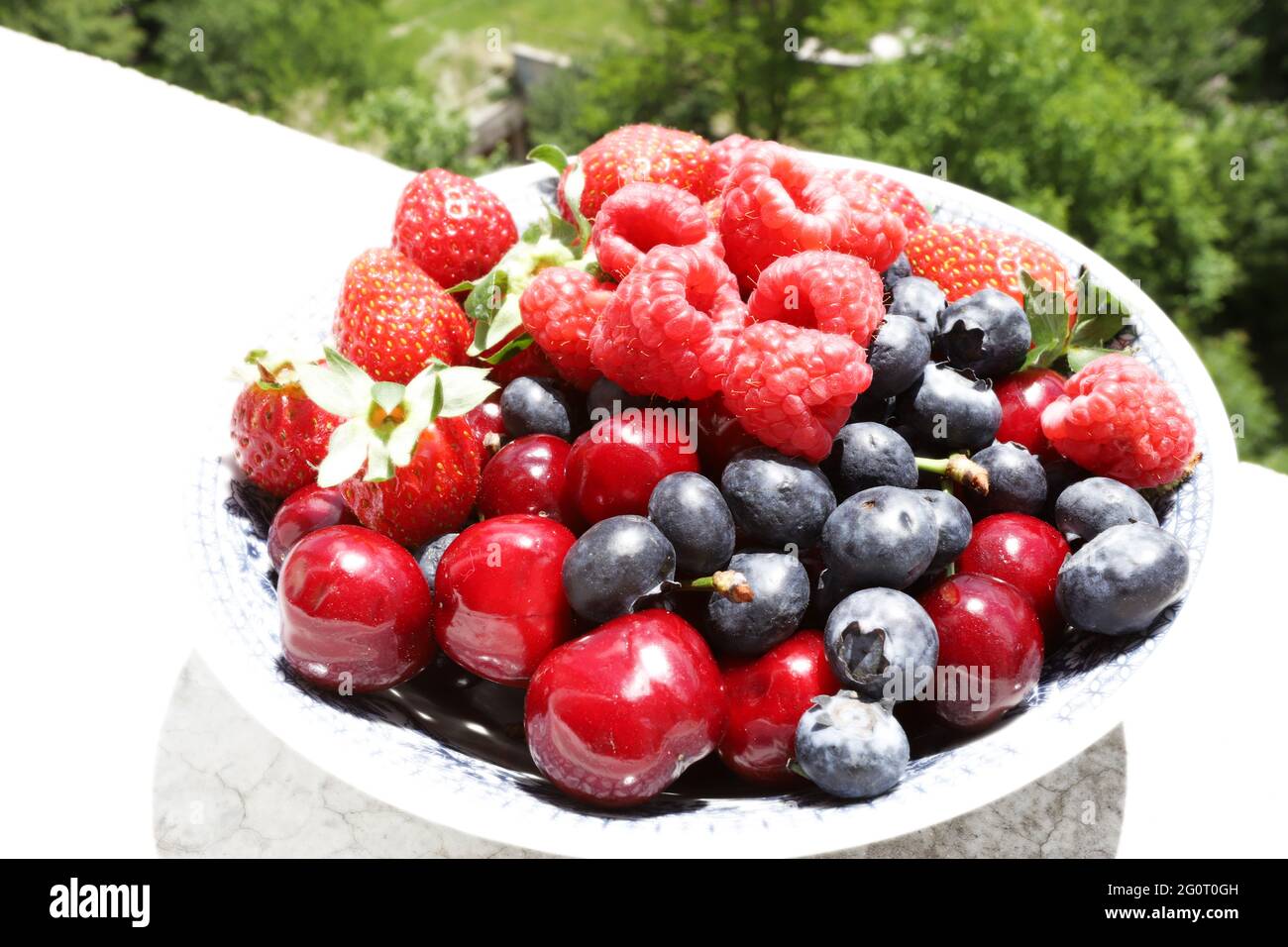 Fresh fruits and berries on daylight Stock Photo