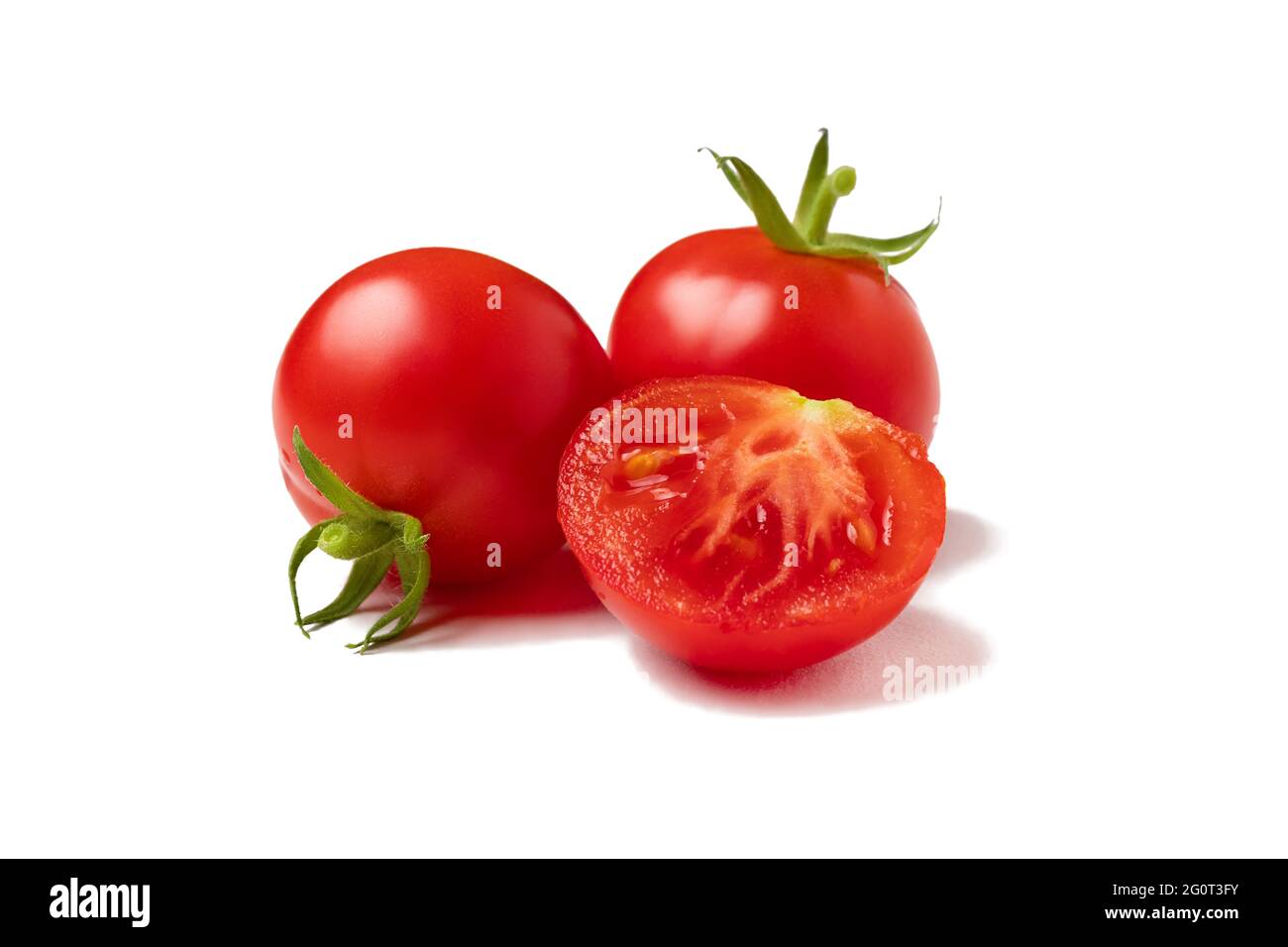 Several ripe cherry tomatoes isolated on white background Stock Photo