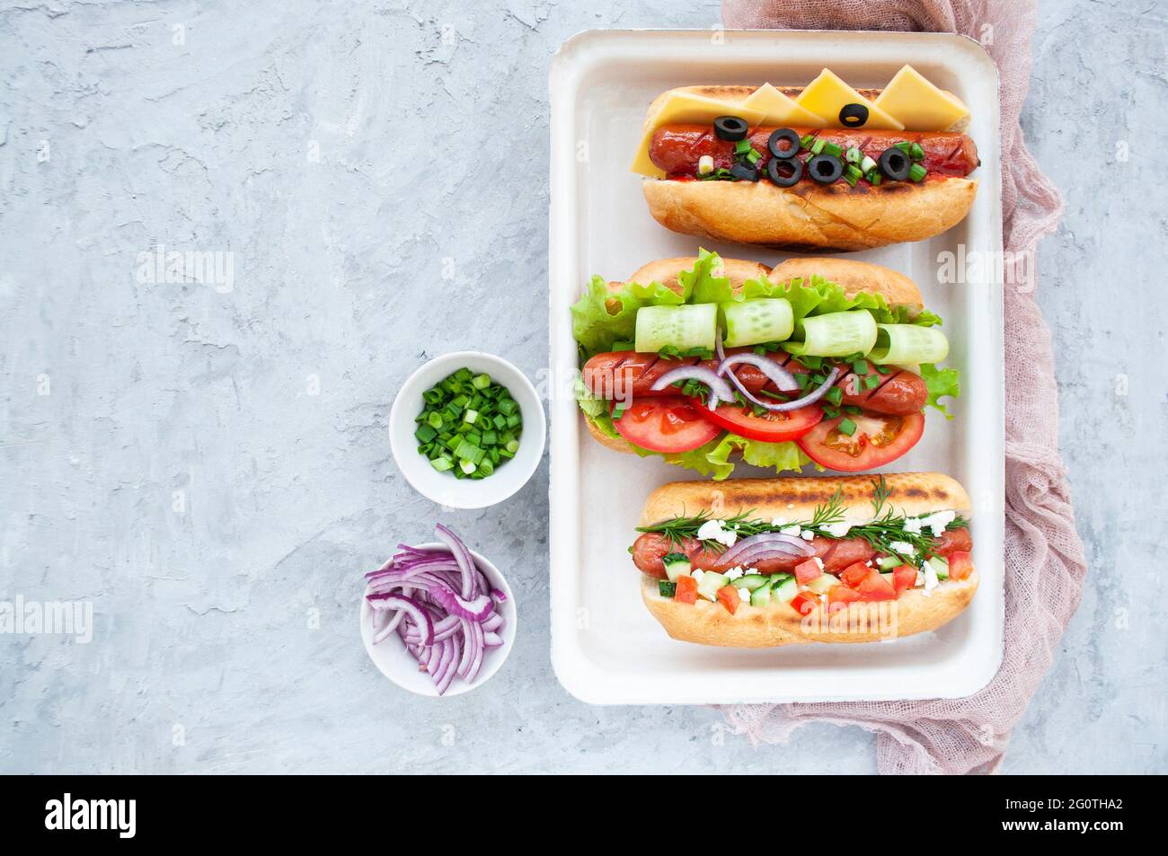 Top view of a delicious freshly cooked hot dogs fully loaded with