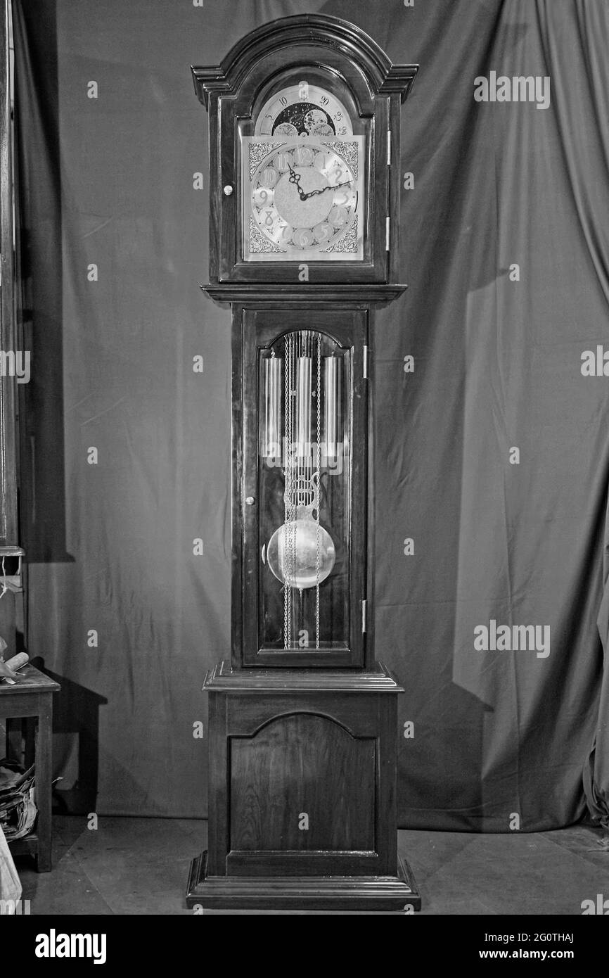 18 Jun 2006 Handcrafted Wooden Grandfather Clock with Chain Wedding ready for dispatch in Shop Marine Lines Mumbai Maharashtra India Stock Photo