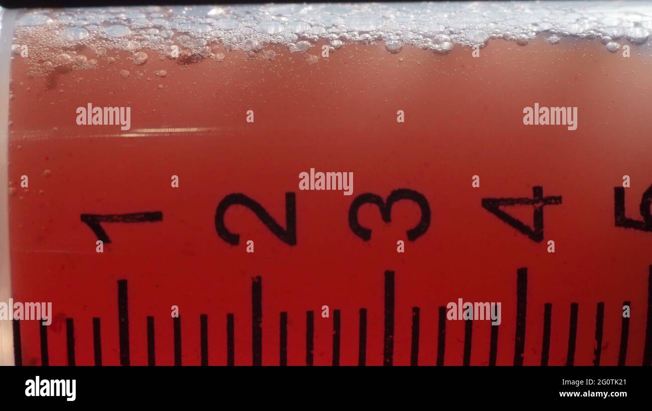 Close-up photo of medical syringe with blood Stock Photo
